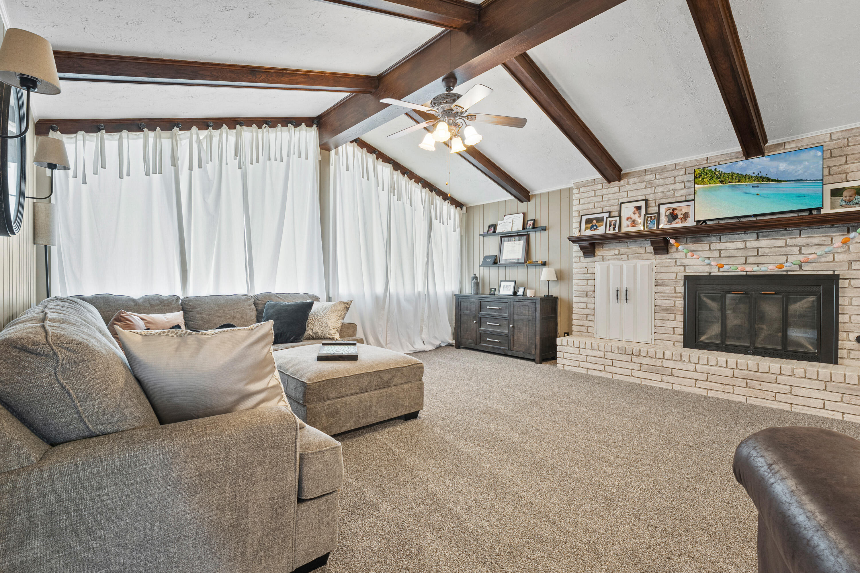 1304 Ave J Ralls, TX 79357 - Photo 6 of 32 a living room with furniture and a fireplace