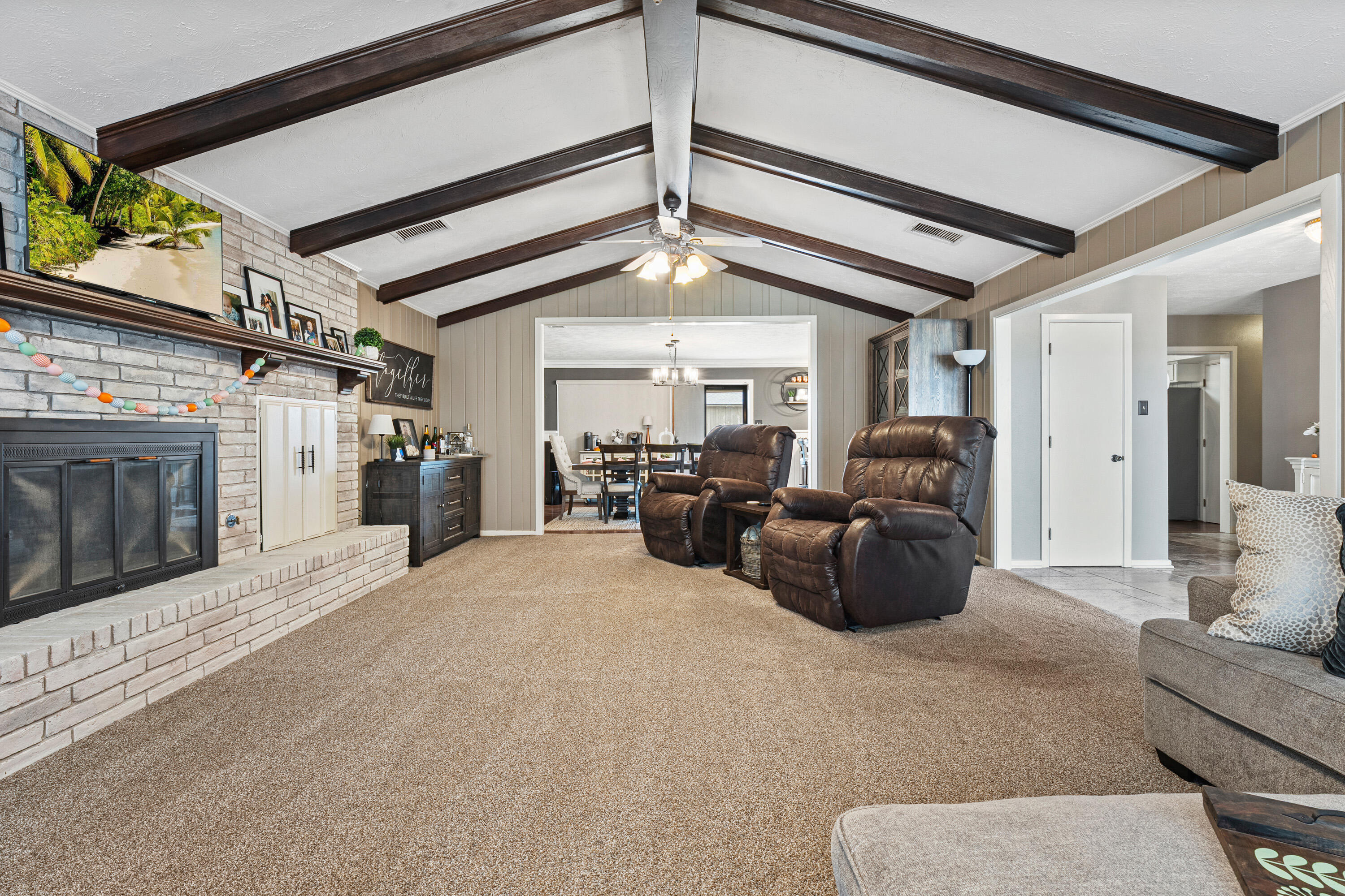 1304 Ave J Ralls, TX 79357 - Photo 8 of 32 a living room with furniture and a fireplace