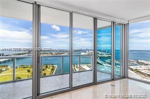 888 Biscayne Boulevard, Unit 2709 Miami, FL 33132 - Photo 4 of 31 a view of a glass door and porch