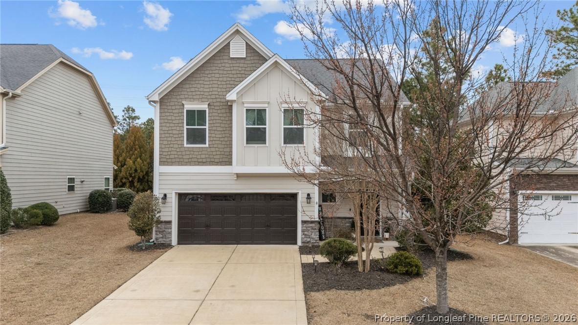 994 Micahs Way North Spring Lake, NC 28390 - Photo 2 of 42 a front view of a house with yard
