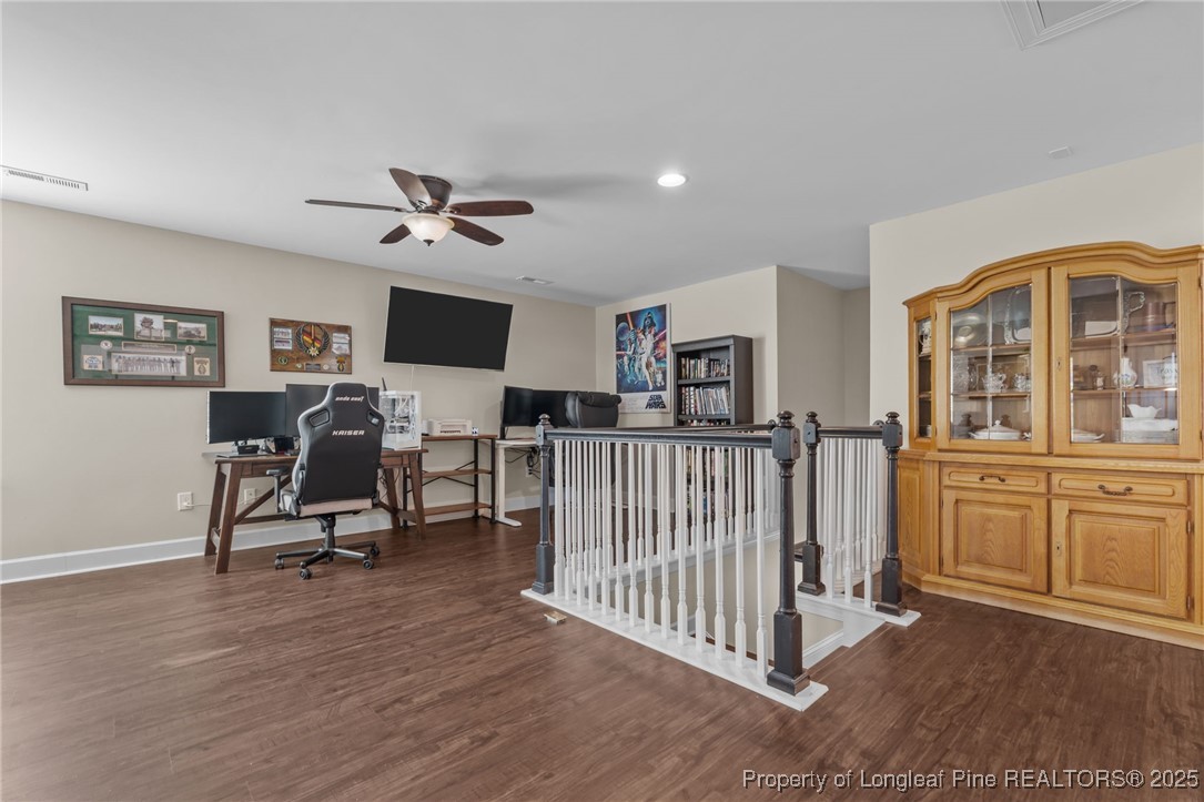 994 Micahs Way North Spring Lake, NC 28390 - Photo 22 of 42 a living room with furniture and a window
