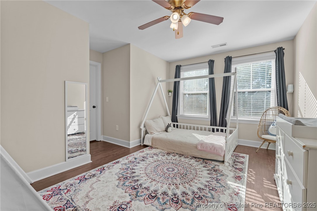 994 Micahs Way North Spring Lake, NC 28390 - Photo 25 of 42 a living room with furniture and a window