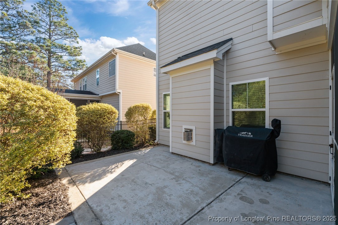 994 Micahs Way North Spring Lake, NC 28390 - Photo 35 of 42 a view of a house with a back yard