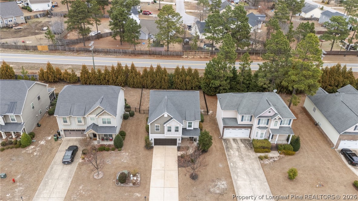 994 Micahs Way North Spring Lake, NC 28390 - Photo 37 of 42 an aerial view of residential houses with outdoor space and river