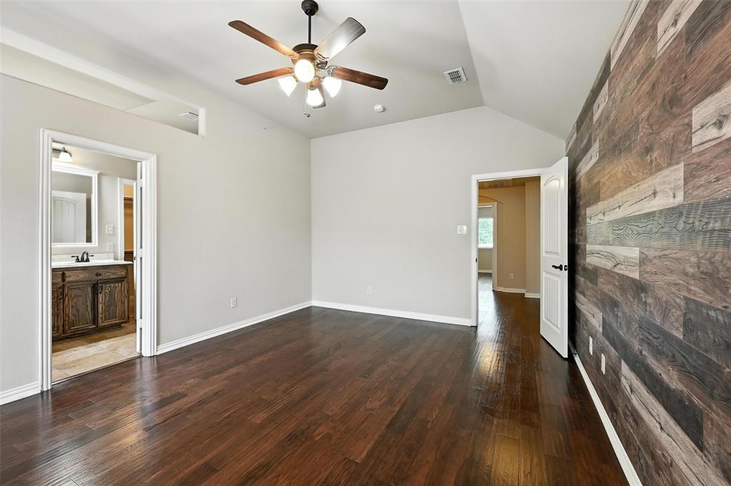 205 Corinna Court Hurst, TX 76053 - Photo 21 of 25 wooden floor in an empty room with a window