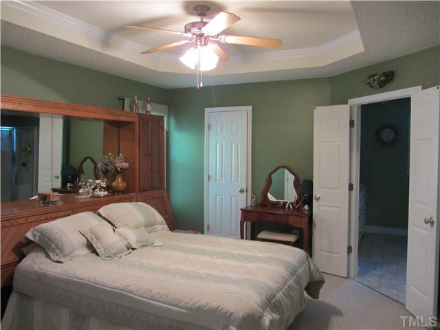 309 Russ Road Smithfield, NC 27577 - Photo 13 of 25 Master retreat has trey ceiling & 2 separate closets!