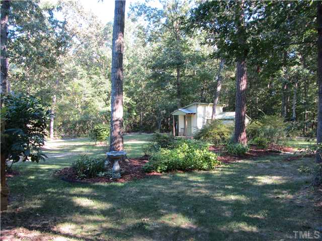 309 Russ Road Smithfield, NC 27577 - Photo 23 of 25 Landscaped with colorful perennials!