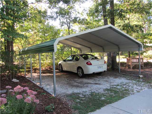 309 Russ Road Smithfield, NC 27577 - Photo 25 of 25 Side yard has covered carport for extra vehicles, boats, campers or motor homes!