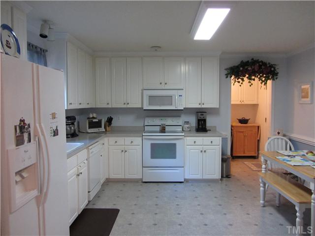 309 Russ Road Smithfield, NC 27577 - Photo 8 of 25 Lots of cabinets & storage!