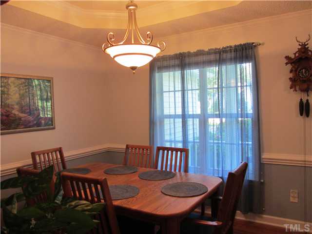 309 Russ Road Smithfield, NC 27577 - Photo 9 of 25 Formal dining with trey ceiling & hardwood floors!