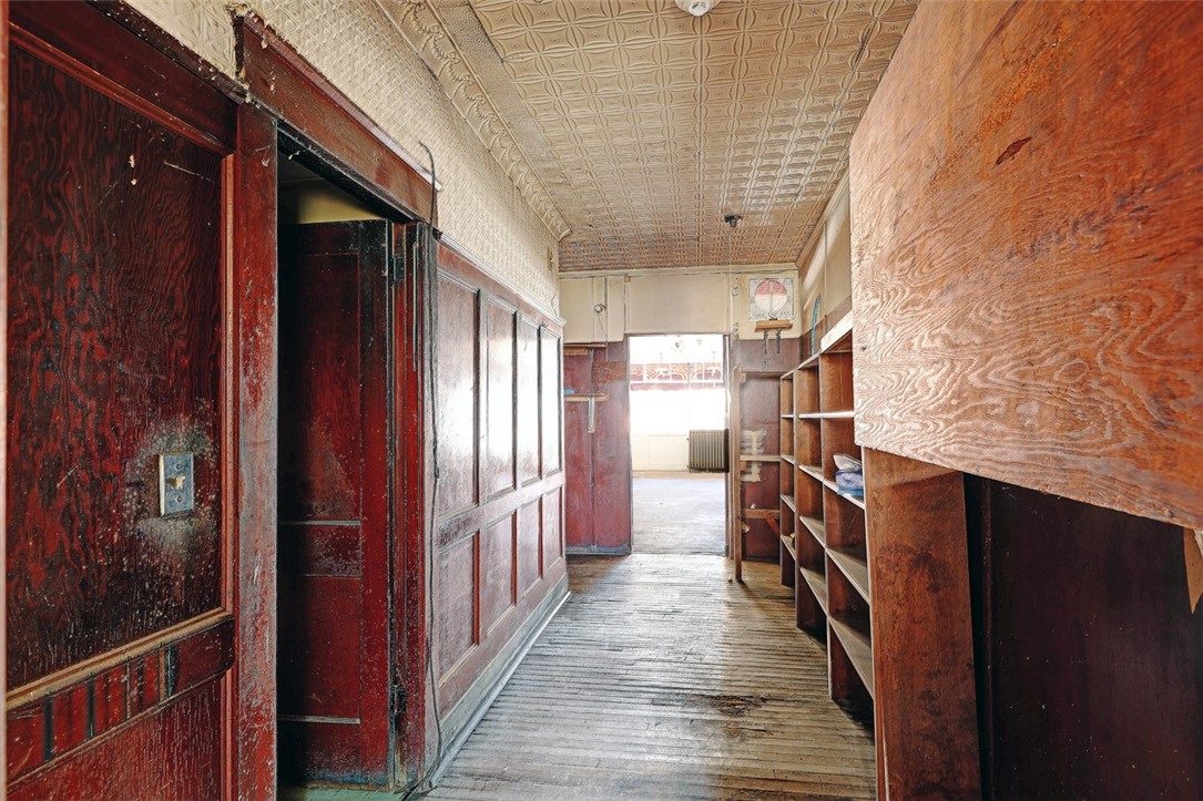 49 Water Street Warren, RI 02885 - Photo 11 of 37 Backroom hallway with bathrooms