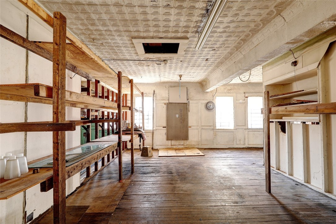49 Water Street Warren, RI 02885 - Photo 10 of 37 Backroom with distinct spaces.