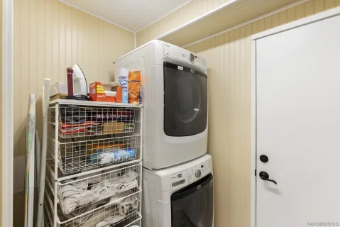 a bed room with a bed and a television