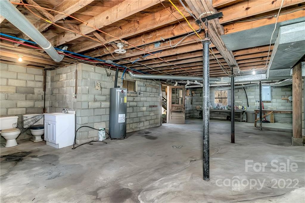 1470 Max Thompson Road Canton, NC 28716 - Photo 27 of 35 a view of a room with wooden walls