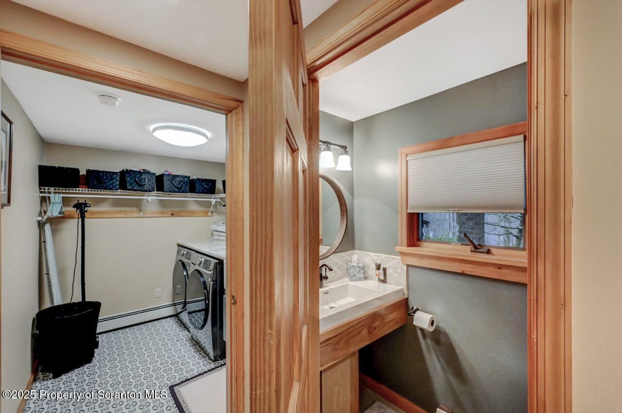 933 Newton Road Clarks Summit, PA 18411 - Photo 35 of 95 laundry and half bath
