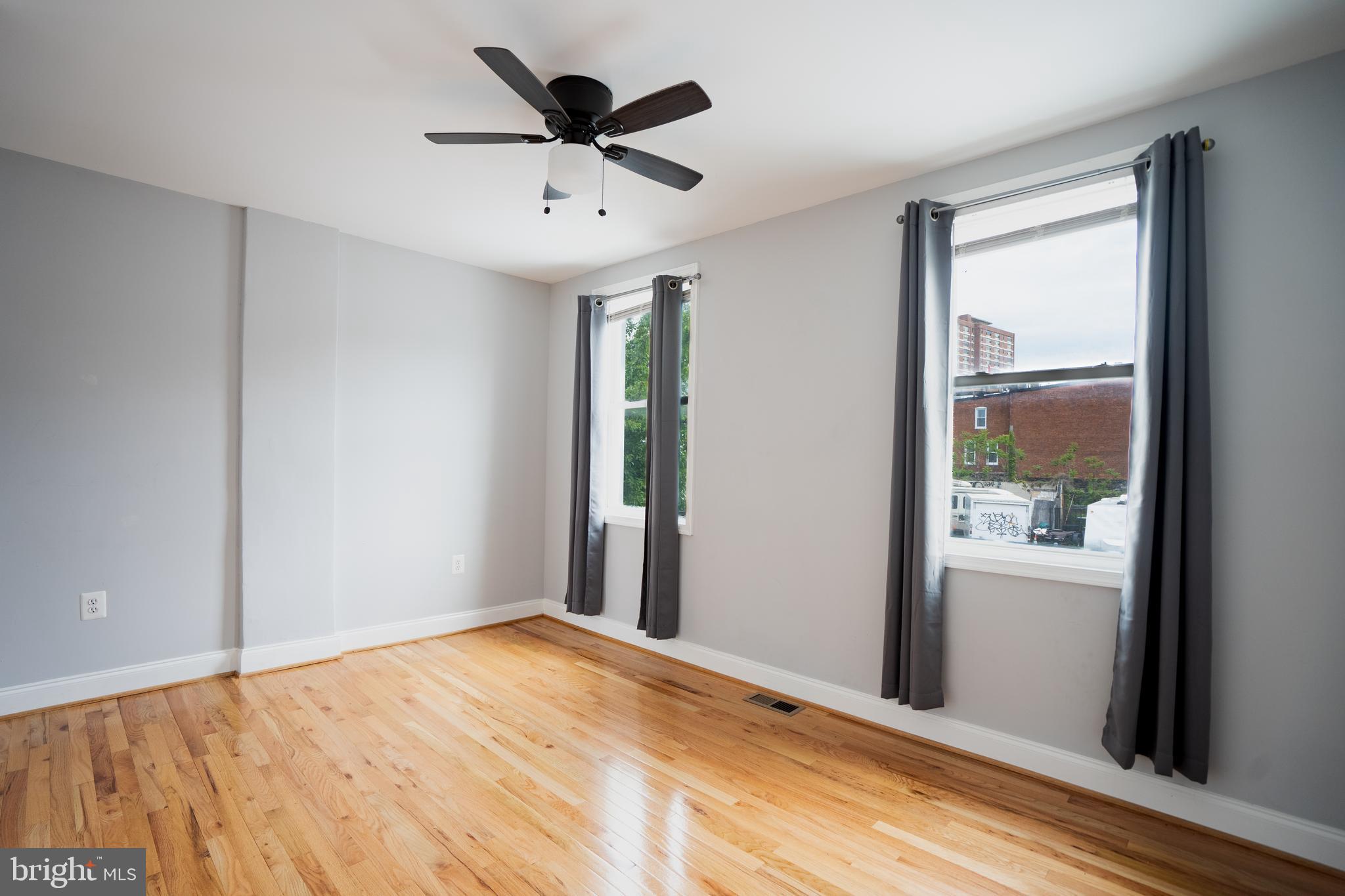 3804 Falls Road Baltimore, MD 21211 - Photo 6 of 18 a view of an empty room with a window