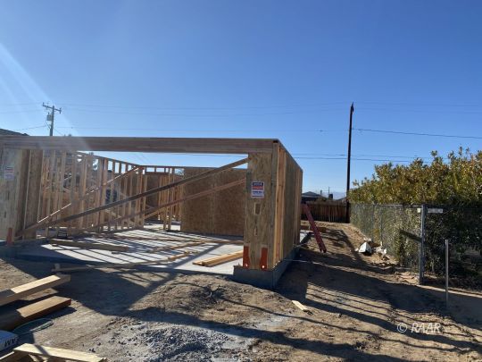 1001 Sims Street Ridgecrest, CA 93555 - Photo 1 of 6 a view of a backyard