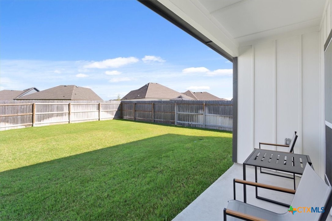 1214 Coriander Road Temple, TX 76501 - Photo 33 of 36 The fenced in backyard has a 6' privacy fence.
