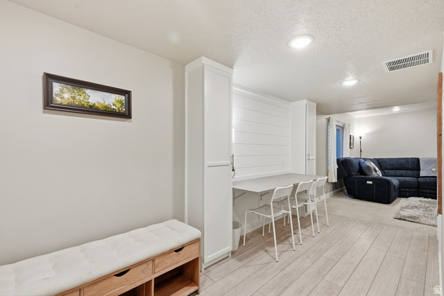 3244 West 1670th Street North Provo, UT 84601 - Photo 39 of 56 Light wood-finish flooring complements the neutral wall color