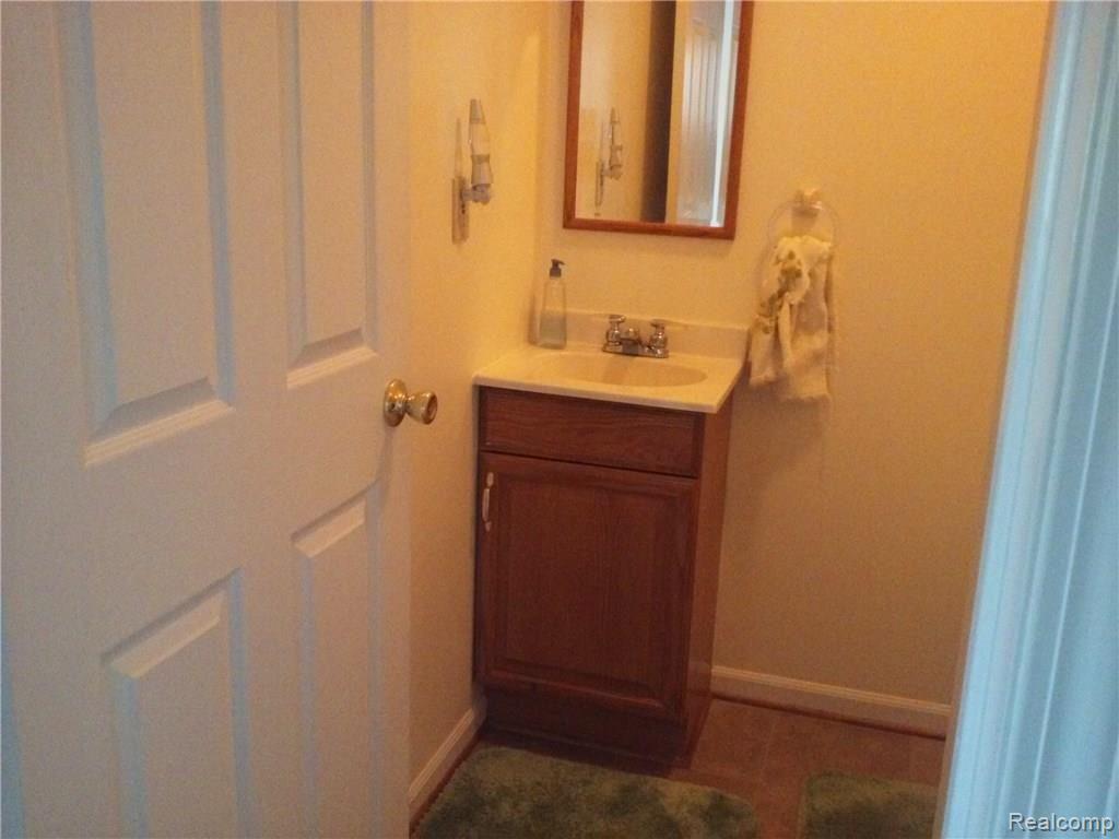 4660 Capac Road Capac, MI 48014 - Photo 40 of 65 This is a view of the half bath.