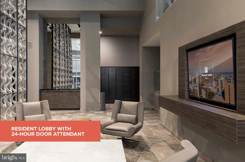 200 North 16th Street, Unit 2111 Philadelphia, PA 19102 - Photo 20 of 66 a view of a hallway with couch and dining area