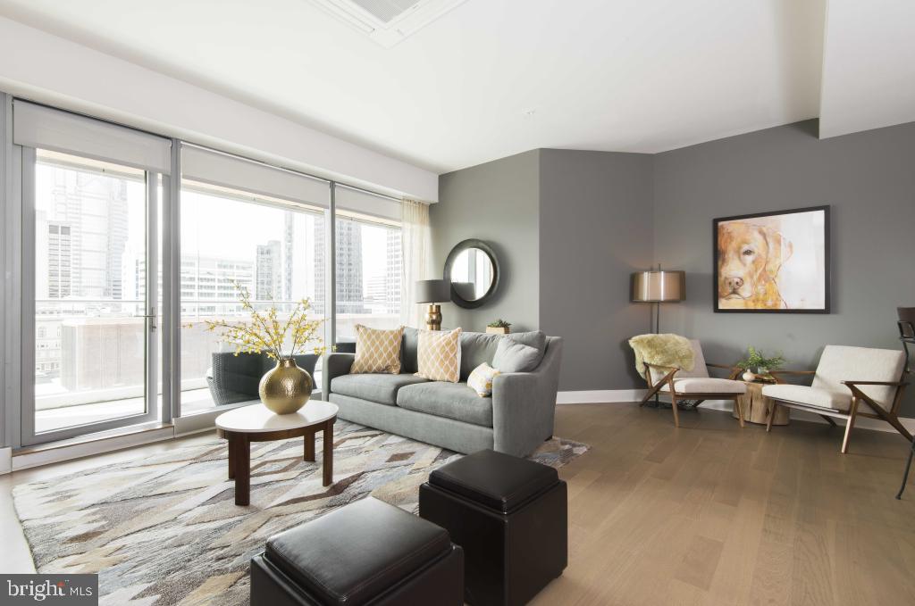 200 North 16th Street, Unit 2111 Philadelphia, PA 19102 - Photo 41 of 66 a living room with furniture and a large window