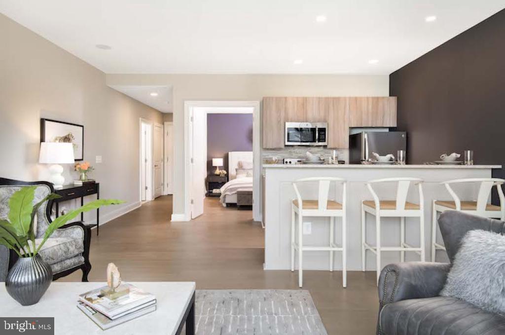 200 North 16th Street, Unit 2111 Philadelphia, PA 19102 - Photo 49 of 66 a living room with furniture and a couch