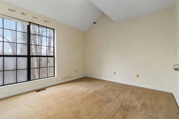an empty room with windows
