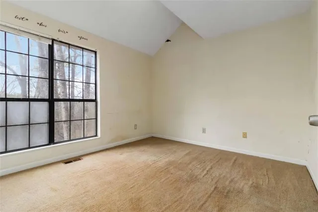 an empty room with windows