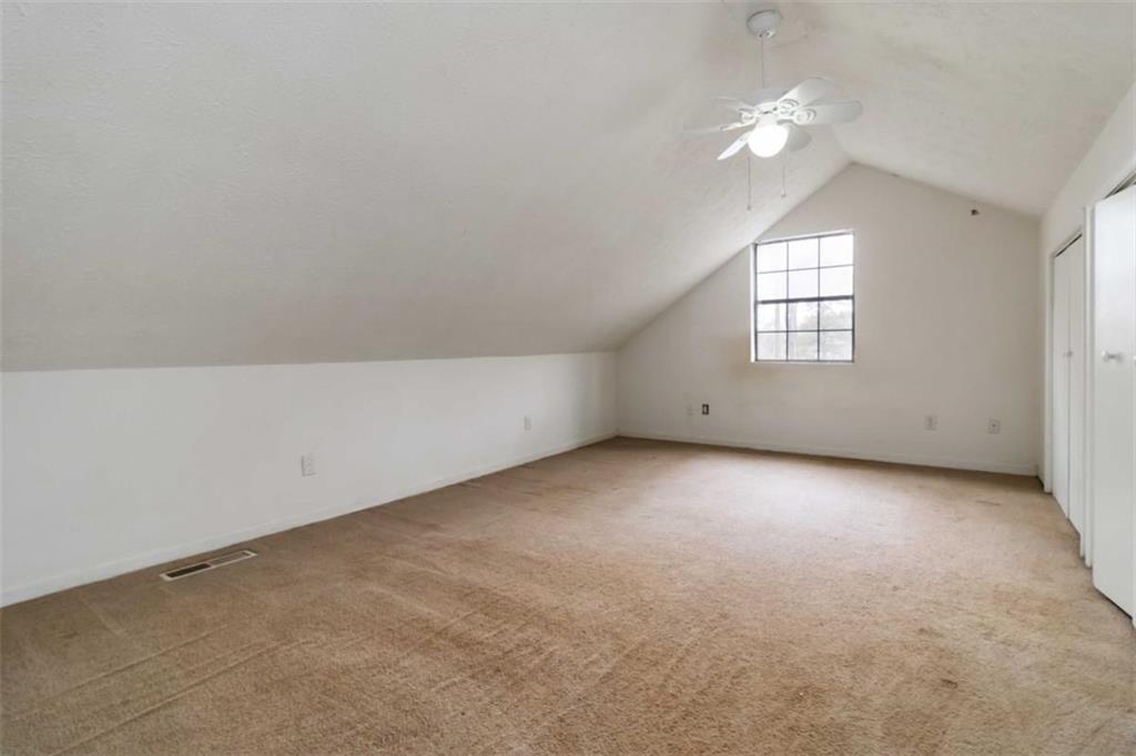 5552 Little Mill Road Buford, GA 30518 - Photo 24 of 30 an empty room with a window