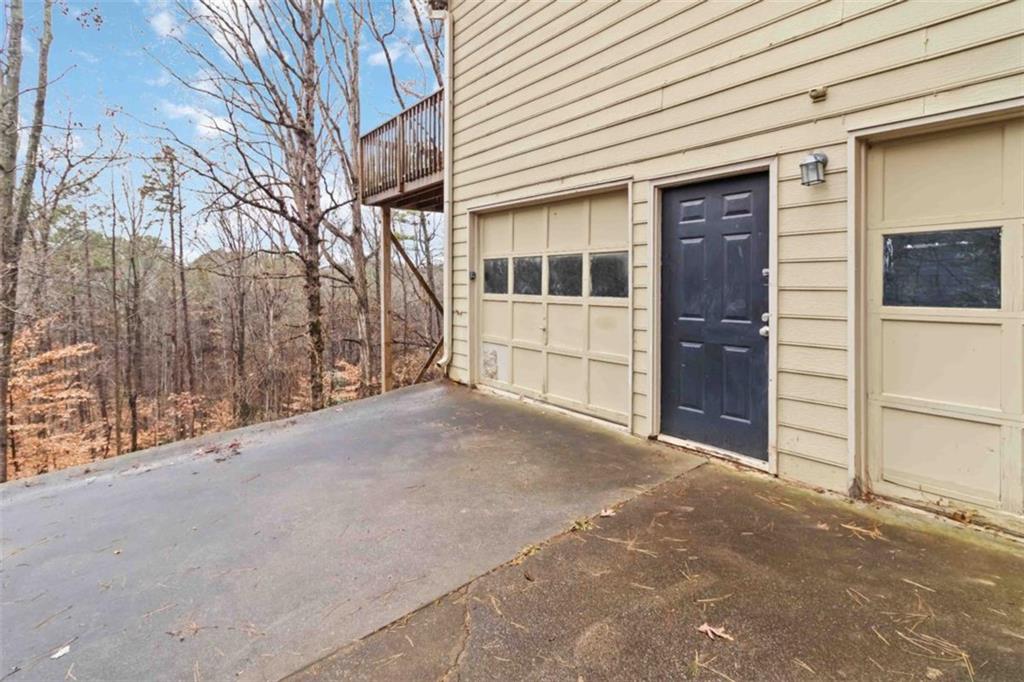 5552 Little Mill Road Buford, GA 30518 - Photo 5 of 30 a view of a house with a outdoor space
