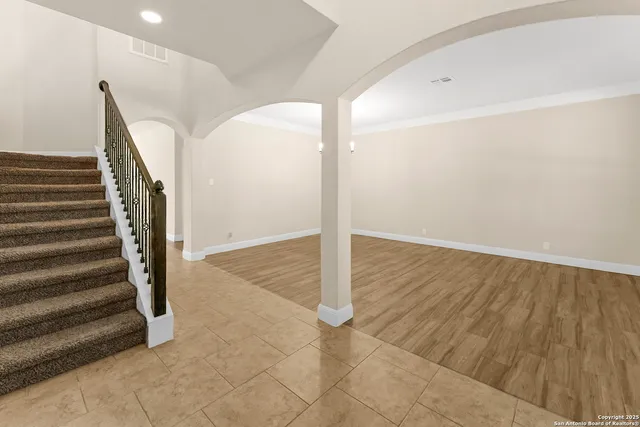 a view of entryway with wooden floor