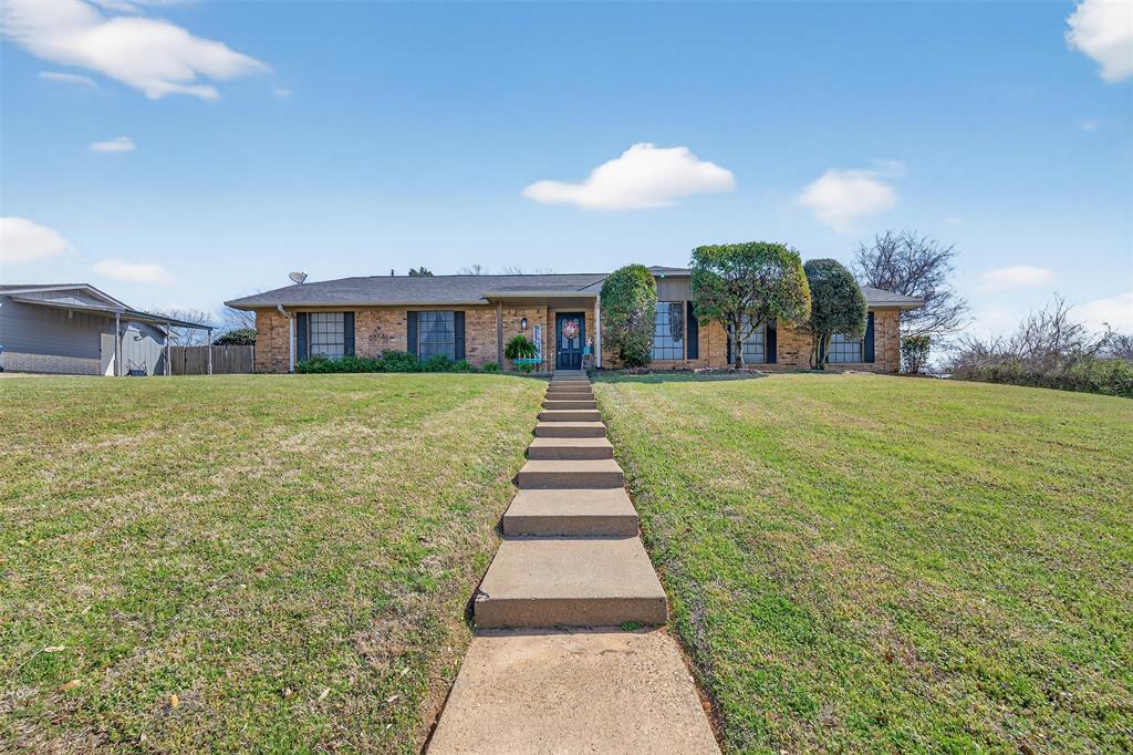 209 Colonial Circle Athens, TX 75751 - Photo 1 of 22 a front view of a house with a yard