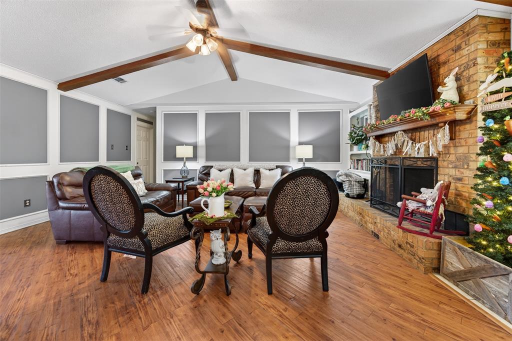 209 Colonial Circle Athens, TX 75751 - Photo 16 of 22 a living room with furniture and a fireplace