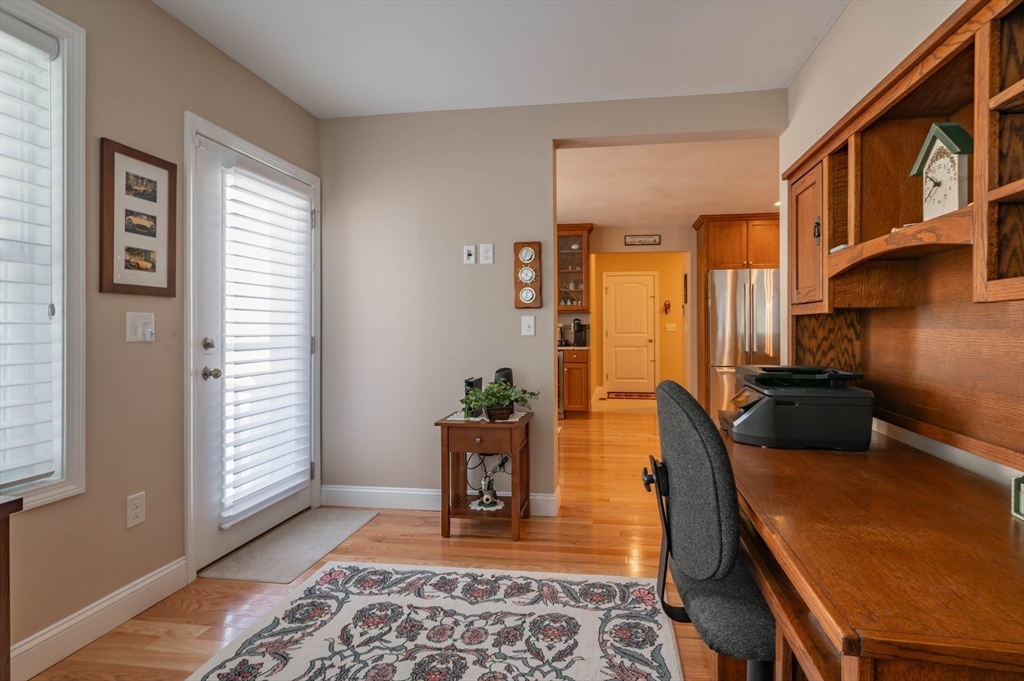 9 Pilgrim Circle Nashua, NH 03063 - Photo 17 of 39 a living room with furniture and a window