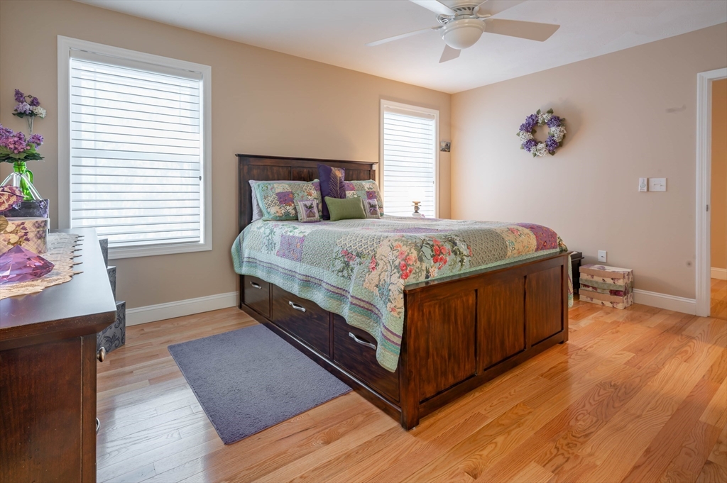 9 Pilgrim Circle Nashua, NH 03063 - Photo 19 of 39 a bed room with a bed and a window