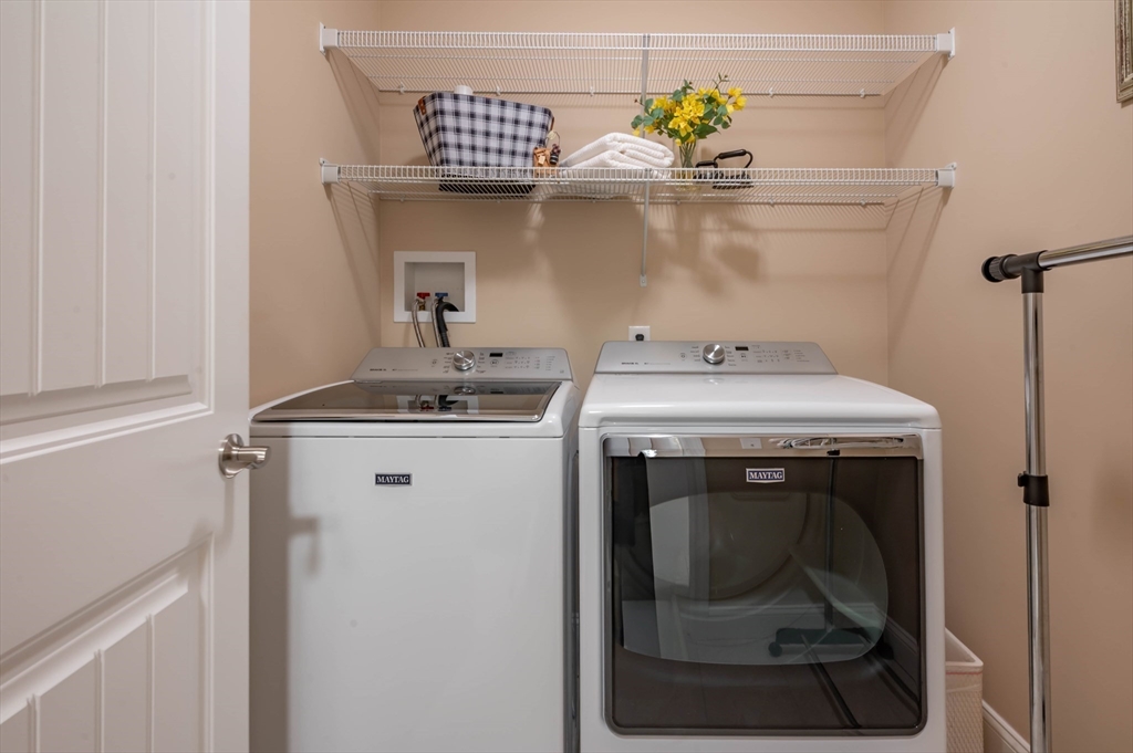 9 Pilgrim Circle Nashua, NH 03063 - Photo 37 of 39 a utility room with a sink dryer and washer