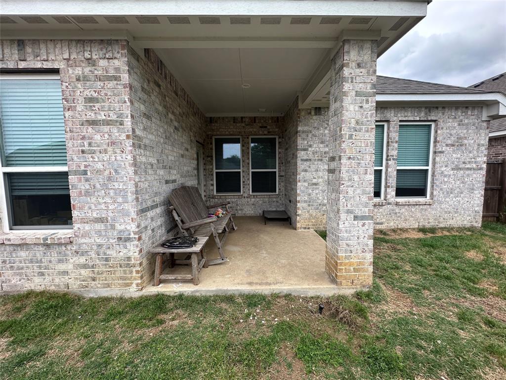 324 Bronco Drive Pilot Point, TX 76258 - Photo 16 of 17 a front view of a house with patio