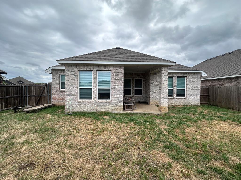 324 Bronco Drive Pilot Point, TX 76258 - Photo 17 of 17 a view of a house with backyard