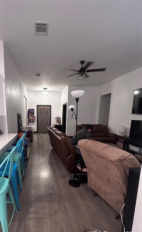 324 Bronco Drive Pilot Point, TX 76258 - Photo 2 of 17 a room with furniture and a wooden floor