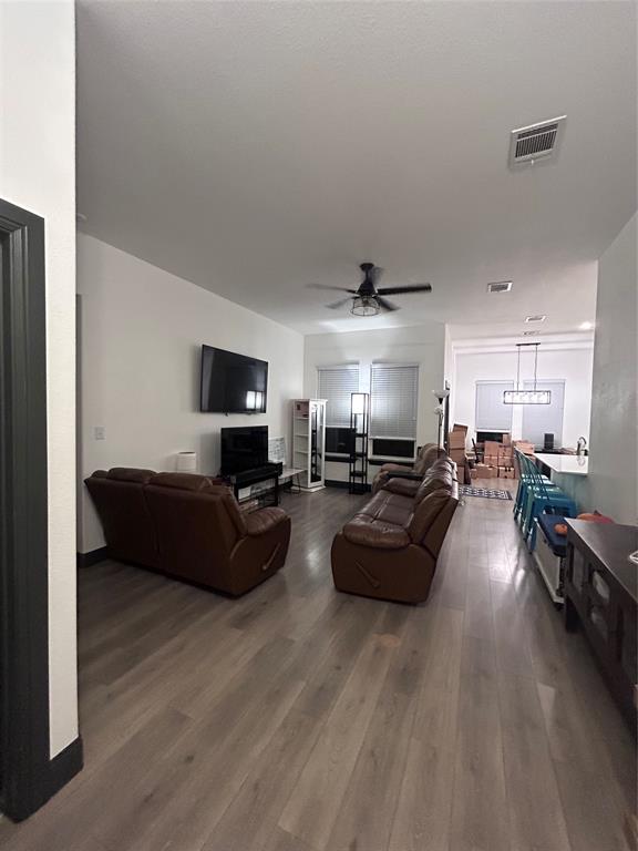 324 Bronco Drive Pilot Point, TX 76258 - Photo 5 of 17 a living room with furniture and a flat screen tv