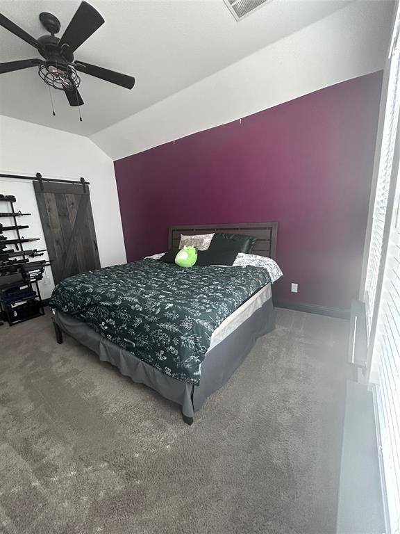 324 Bronco Drive Pilot Point, TX 76258 - Photo 10 of 17 a bed sitting in a room next to a window