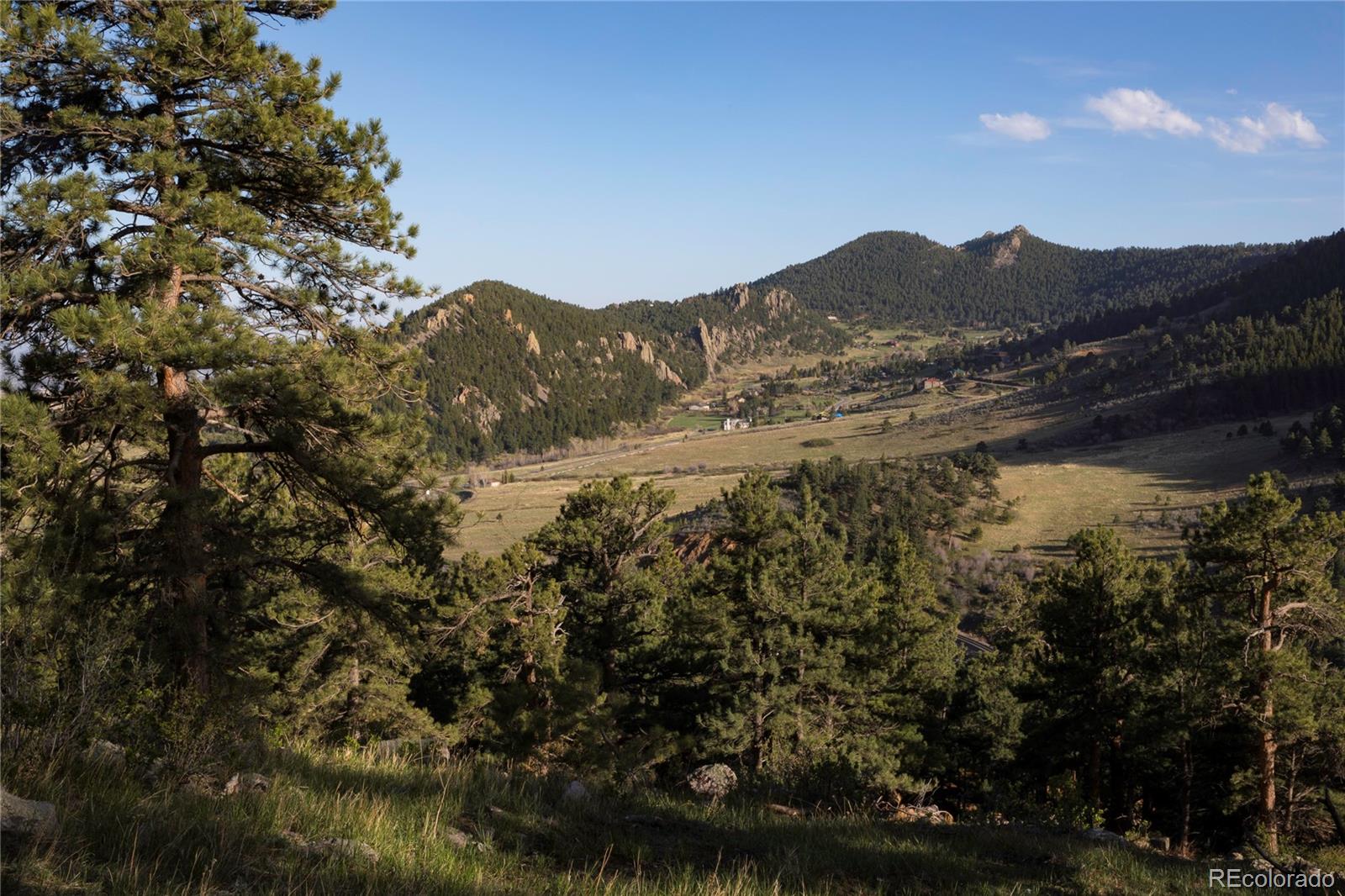 1 North Ridgway Road Arvada, CO 80403 - Photo 9 of 12 a view of a lake in a city