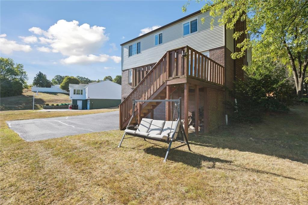129 Kings Drive Monaca, PA 15061 - Photo 30 of 36 a view of a house with a yard