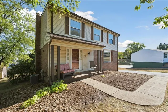 a view of a yard with trees