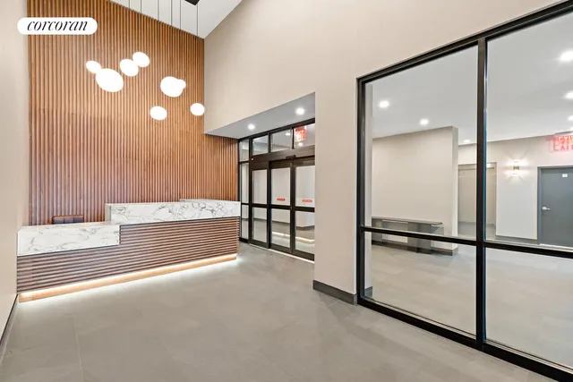 a view of hallway with a large mirror