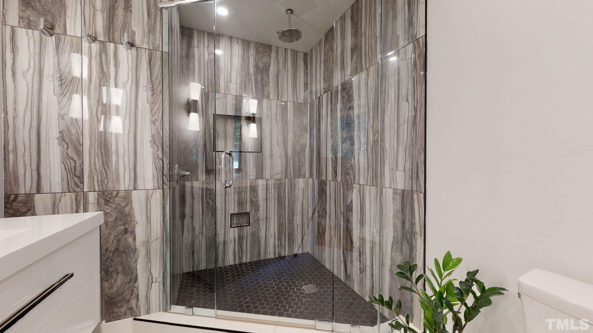 4211 Juniper Street Raleigh, NC 27612 - Photo 22 of 30 You are going to love this shower set up.
