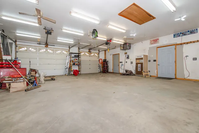 a view of a garage with storage
