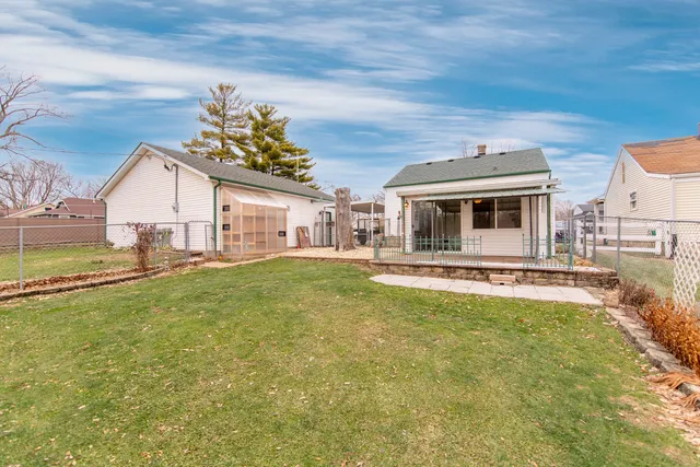 a front view of a house with swimming pool