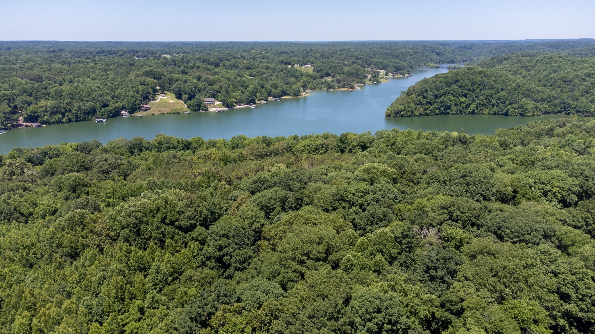0 Turkey Creek Boat Dock Road Tullahoma, TN 37388 - Photo 17 of 39 an aerial view of green landscape with trees houses and lake view